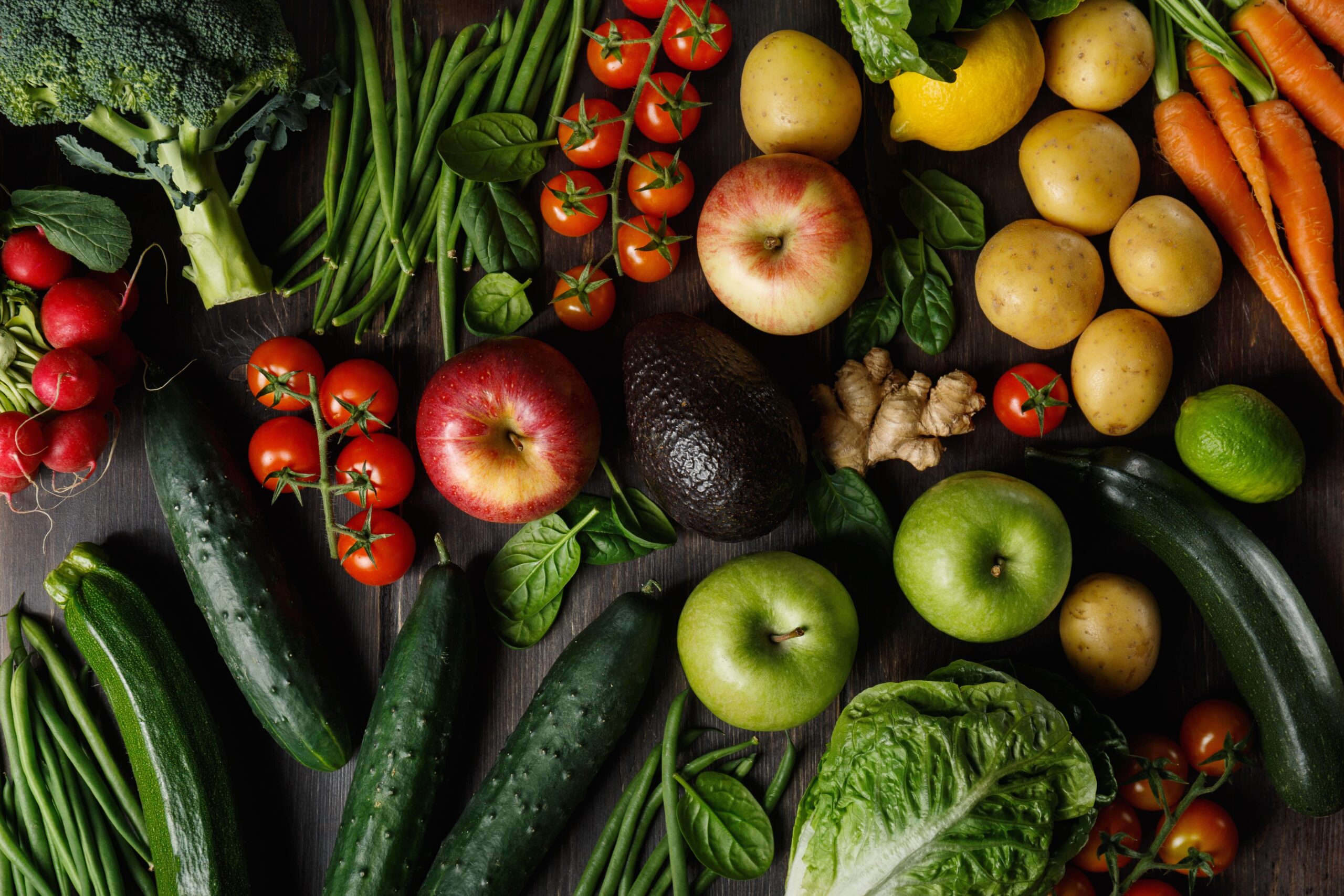 Fresh brightly coloured vegetables on a table.