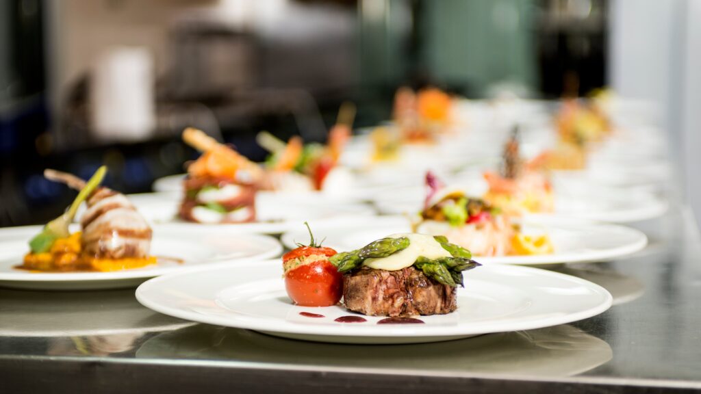Elegant dishes beautifully arranged on plates.